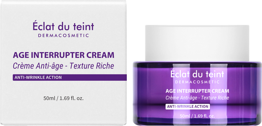Éclat du teint Dermacosmetic Age Interrupter Cream packaging with purple jar and white box.
